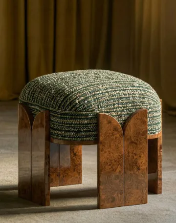 Sculptural pouf with burl wood legs and woven top curated collectible furniture selection