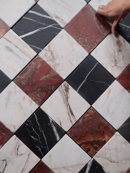 Burgundy black and white marble checkerboard inlay material craft interior design Dubai